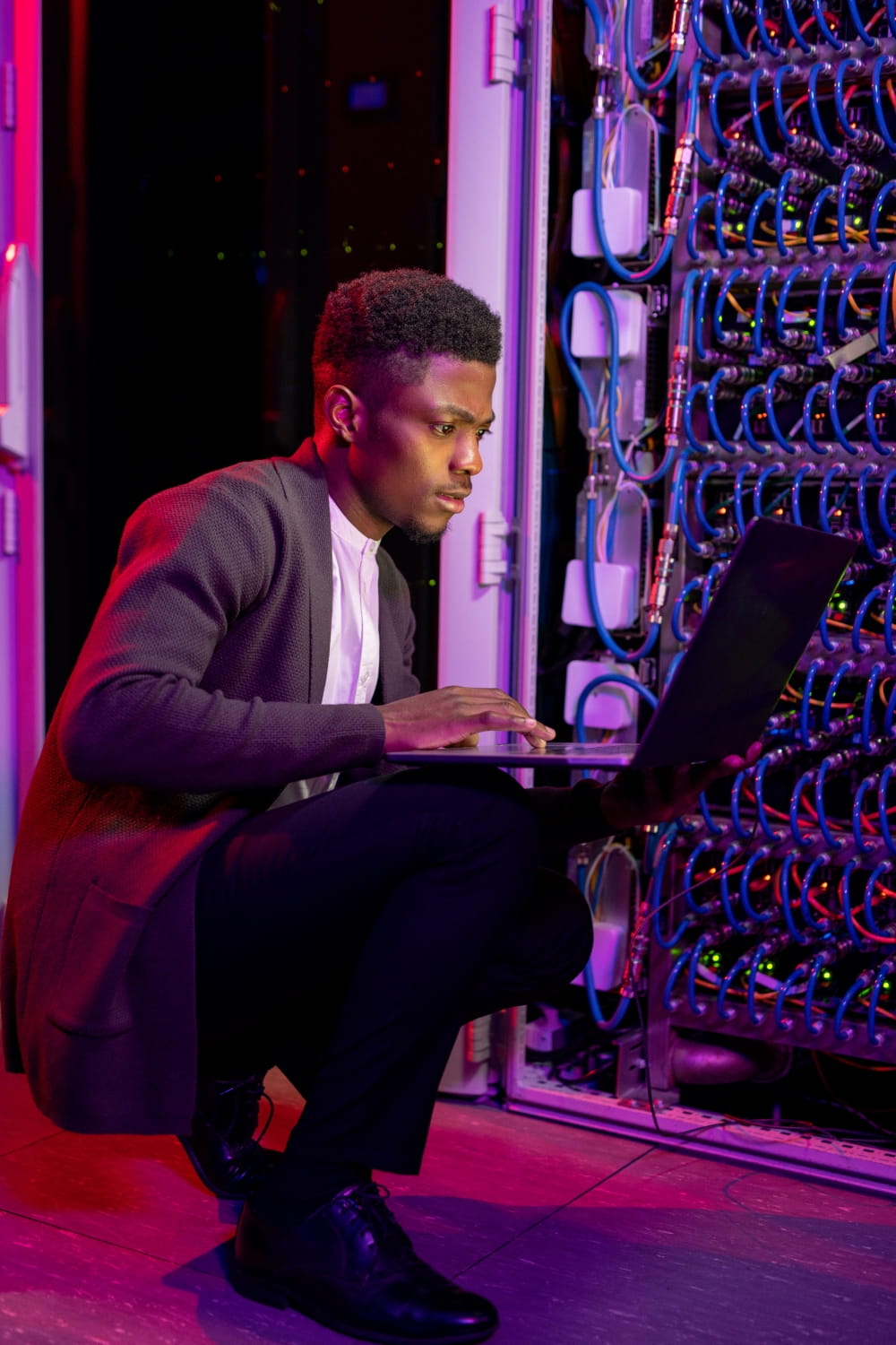 IT engineer reviewing hardware and server infrastructure